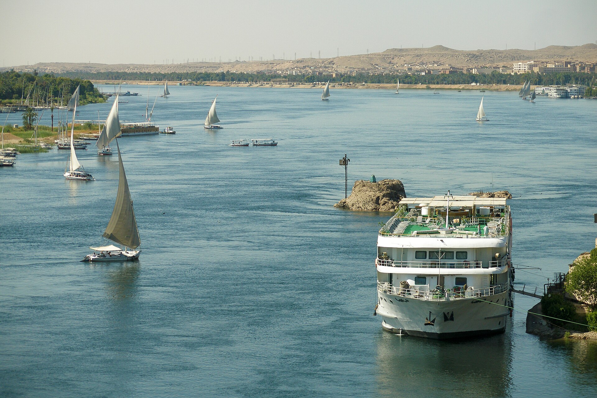 Wooden Nile boats on the river at Aswan — a Grand Muse fieldwork photograph