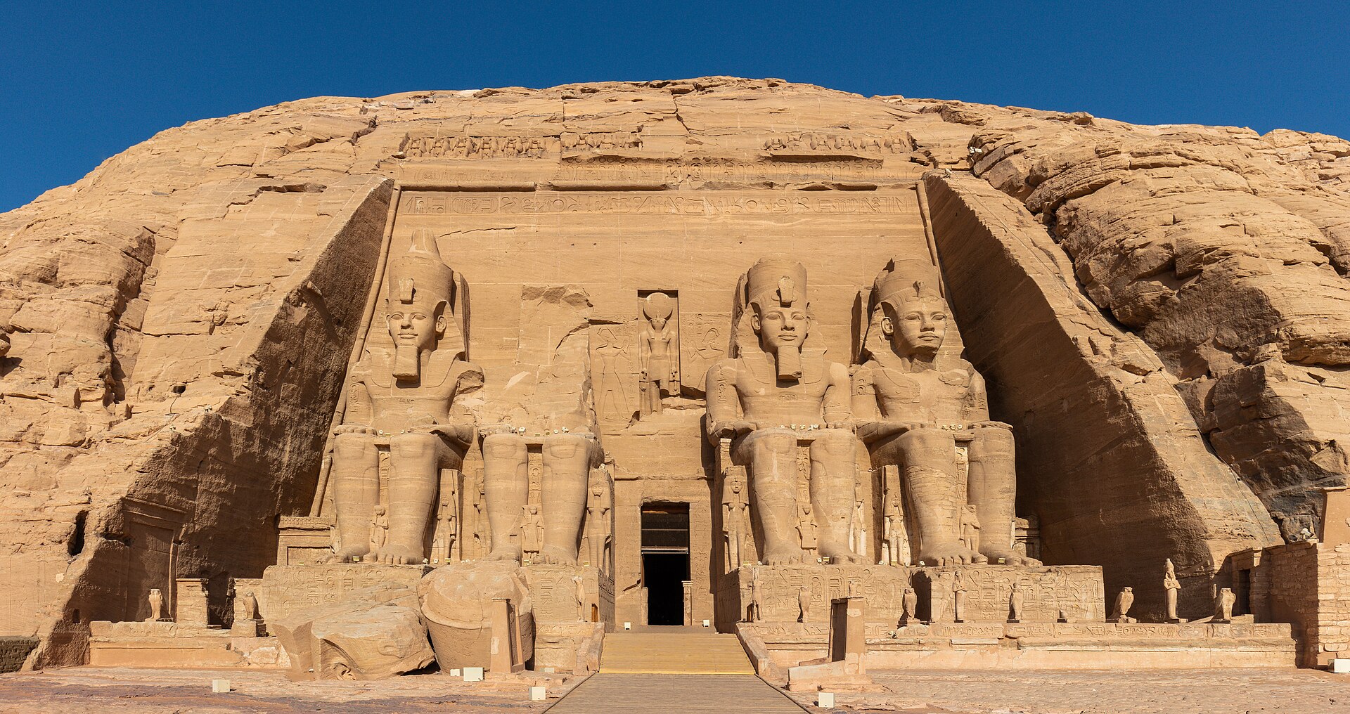 The colossal seated statues of Ramses II at the entrance of Abu Simbel