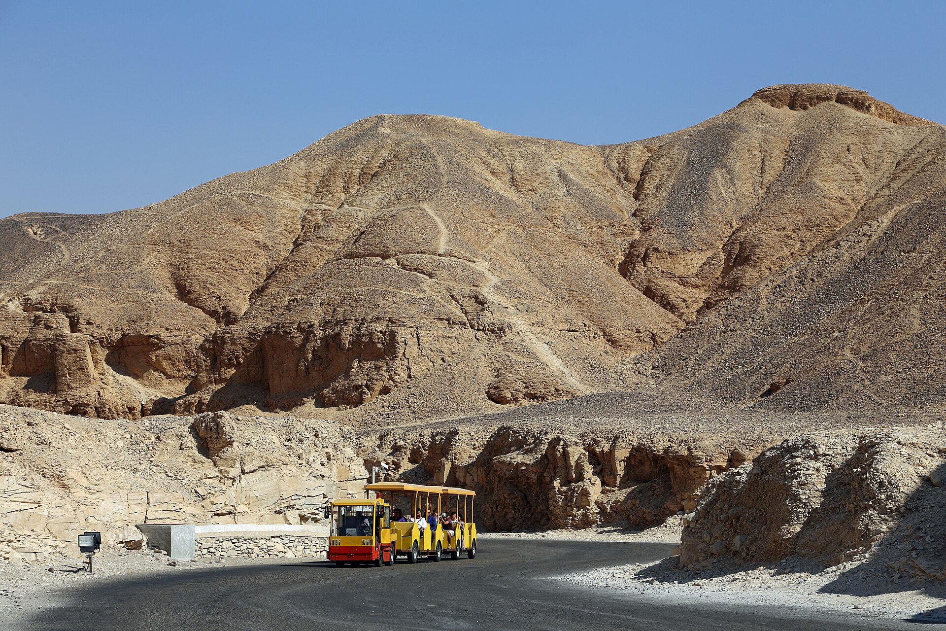 Tomb interior in the Valley of the Kings with painted reliefs along the corridor